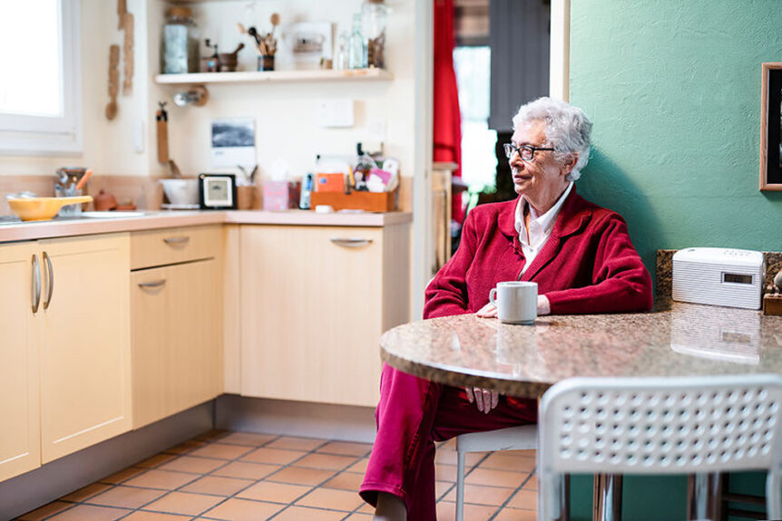 Elderly woman enjoying being taken care of at home